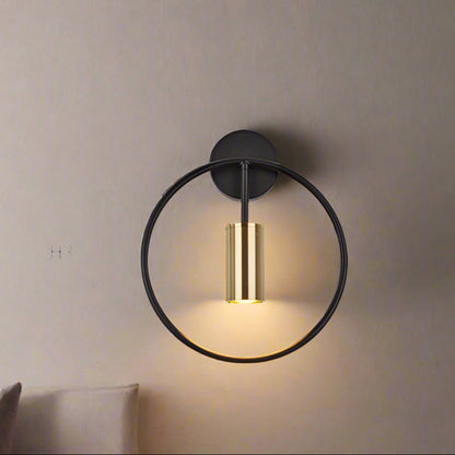 Round golden wall lamp