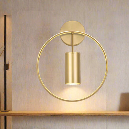 Round golden wall lamp