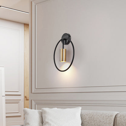 Round golden wall lamp